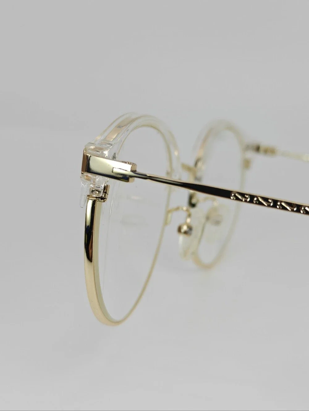 Moon River. Elegant. Round Gold Metal Frame Glasses. Details.